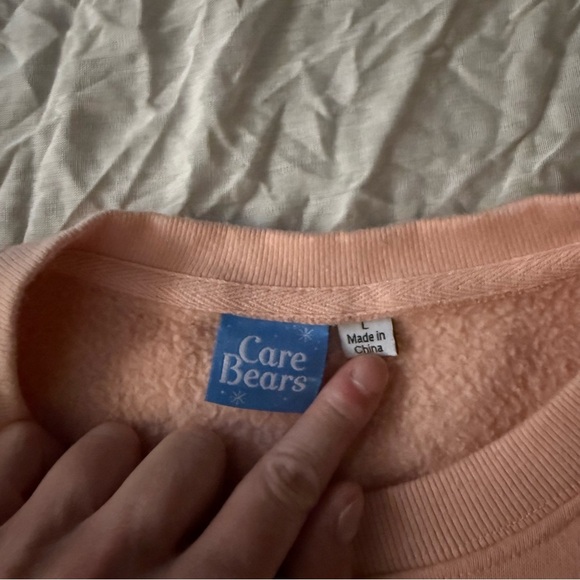 Care Bears Pink Sweatshirt with Bear Spiral Design, Size L - Picture 4 of 6